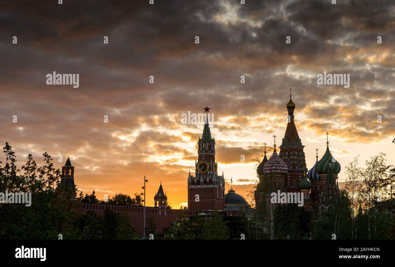 Moscow Kremlin and St Basil`s Cathedral at sunset, Russia. This place is a top tourist attraction of Moscow. Panorama of Moscow landmarks in summer ev Stock Photo